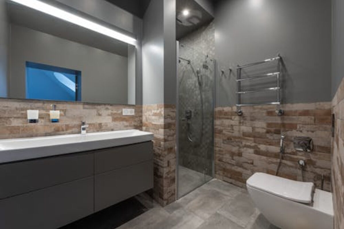 Modern bathroom with tile shower and updated vanity